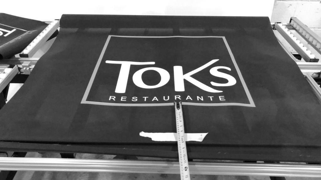 Toks / Branding Persianas